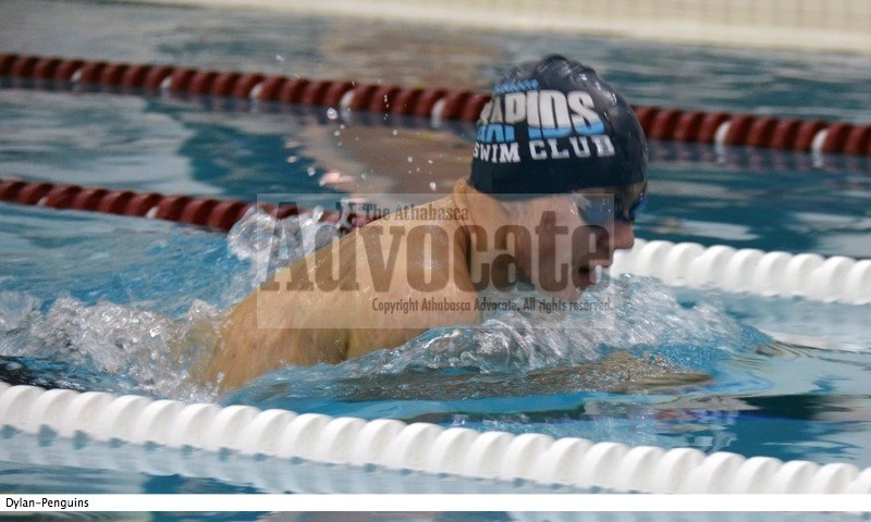 Dylan Fitzsimmons catches a breath during the breatstroke..