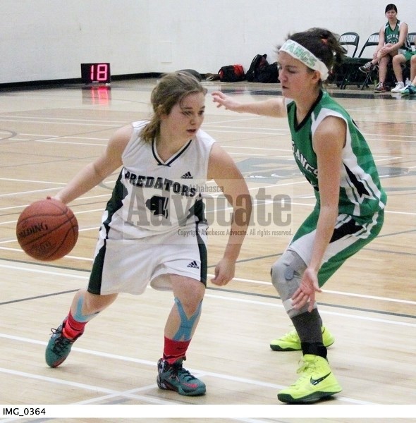 EPC Predators senior girls Bri Kennedy sets up the offence against Onoway during their game last Tuesday.