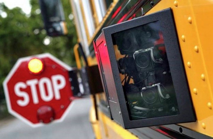 A number of buses used by Aspen View Public Schools have had camera systems – similar to that shown at the right side of the picture — installed in order to record vehicles