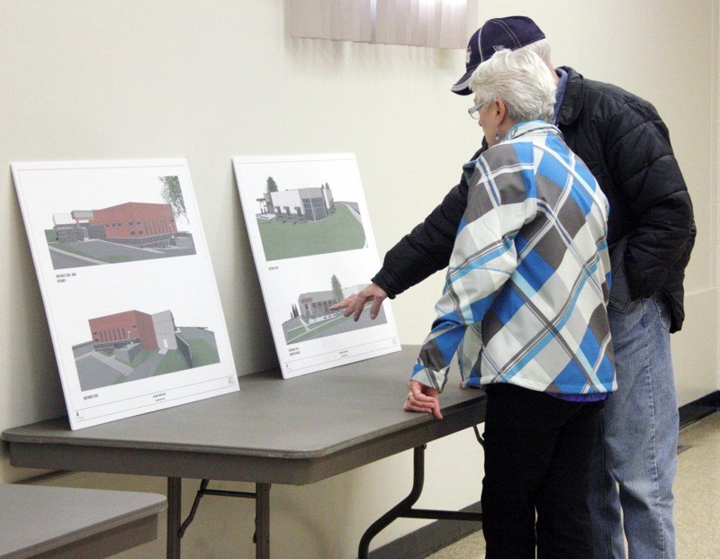 A pair of Boyle residents check out the artist renderings of the exteriors of the new Boyle Municipal Centre on display at the open house.