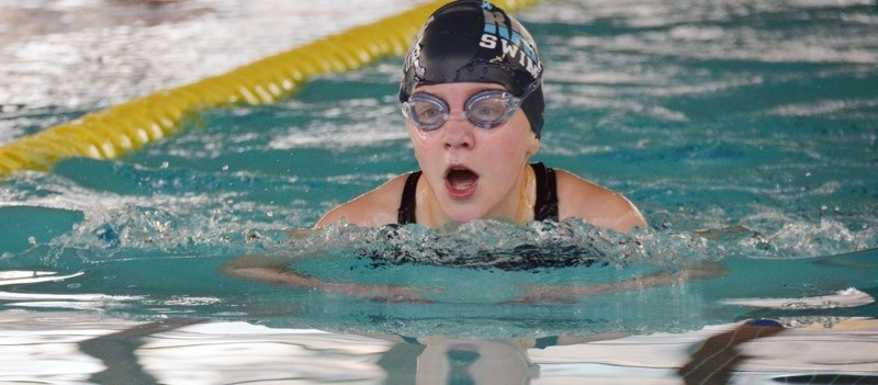 Claire Francis goes hard during her breaststroke race at the meet in Edmonton Apr. 25 and 26.