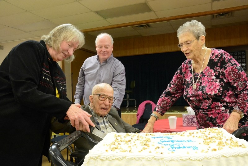 Close to 100 people helped former MLA Frank Appleby celebrate his 100th birthday in December 2013. (l-r) Liz Appleby (Frank&#8217;s daughter-in-law), son Brian, Frank