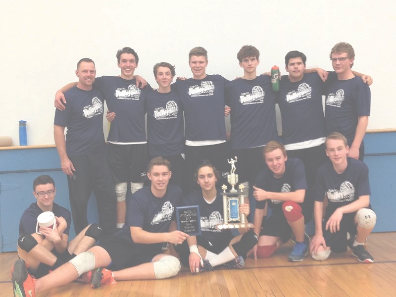 The EPC Predators pose with their newest hardware after winning their fifth-straight volleyball tournament in Edson on Nov. 7 Pictured are Chad LeMessurier (head coach), Evan 