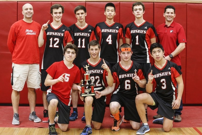 The senior boys pose with their newly-acquired Red Eye Tournament trophy on Nov. 14. The club only lost one game and posted a 4-1 record. Back row, L-R: coach Darrell