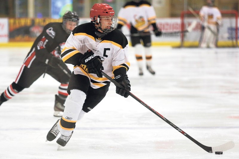 Hawks captain Jackson Roth skates into the offensive zone during a home game on Dec. 12. Roth would end up on the scoresheet over the weekend, assisting on the club&#8217;s