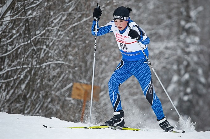 Athabasca Nordic Ski Club member, Bo Maier treks up a hill during his 5km race on Jan 23. Maier finished third in his category with a time of 21:52.