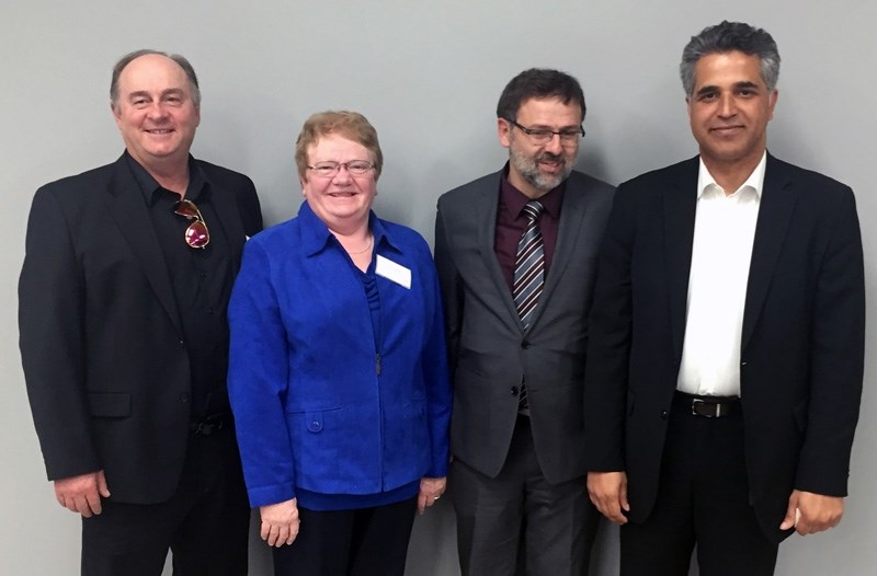 Human Services Minister Irfan Sabir (far right) poses with local politicians (l-r) Town of Athabasca mayor Roger Morill, Athabasca County Reeve Doris Splane and
