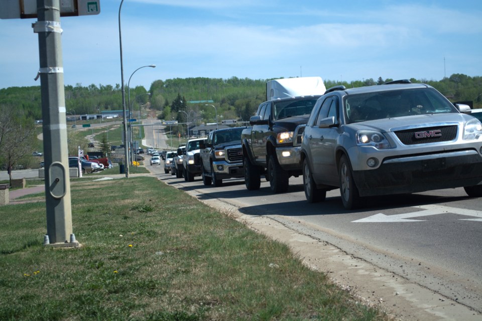 A steady stream of vehicles drove through Athabasca May 4 as people evacuated Fort McMurray and headed into Edmonton.