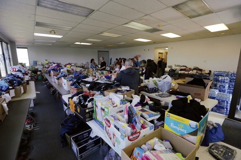 Inside Flo Solutions building where evacuees were getting clothes, food and hygiene products.