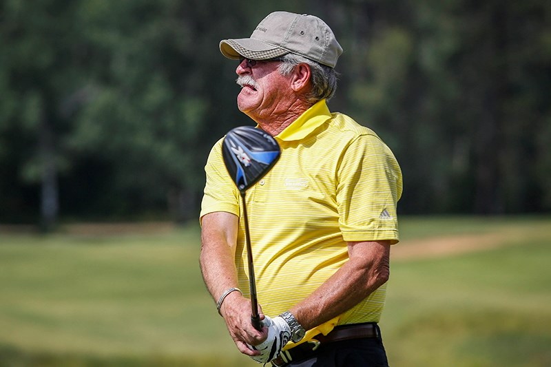 Jerry Laird cringes shortly after his tee off on Hole 15.