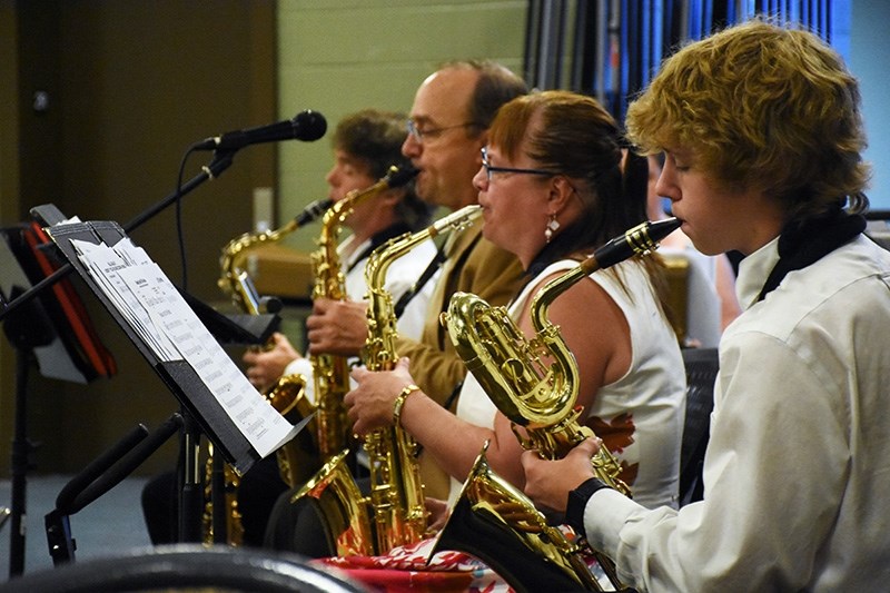 The silky sound of the sax rounds out the big band sound. (R-L) Rhys Haubrich, Joy Young, Reg Silvester and James Haubrich.