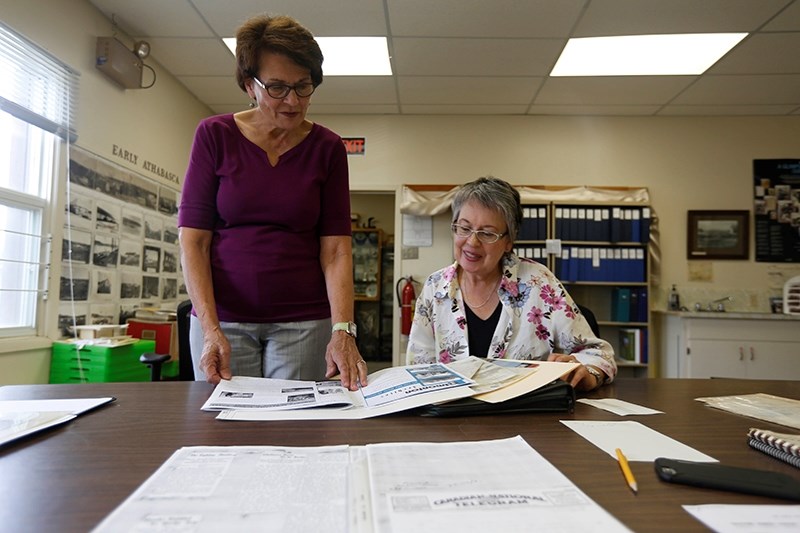 As Athabasca archivist Marilyn Mol (left) retires, Gina Payzant is getting ready to step into the position.