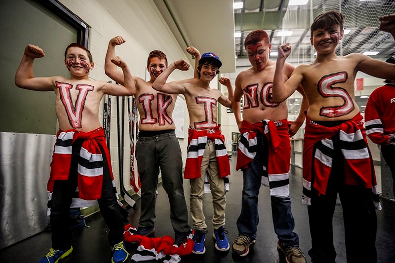 Members of the Augustana Vikings rally squad, Matthew Marches, Caleb Congdon, Jacob Hayward, Ethan Rich and Keenan Ponich go all out for Game 1.