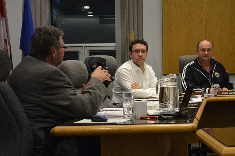 Former town CAO Doug Topinka (left) was back in council chambers Oct. 4, stepping into his old shoes on an interim basis.