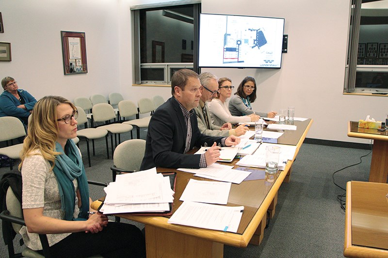 (L-R) Aspen View financial officer Amber Oko, superintendent Mark Francis, board of trustees chair Dennis MacNeil and trustees Anne Karczmar-czyk and Nancy Sand attended the