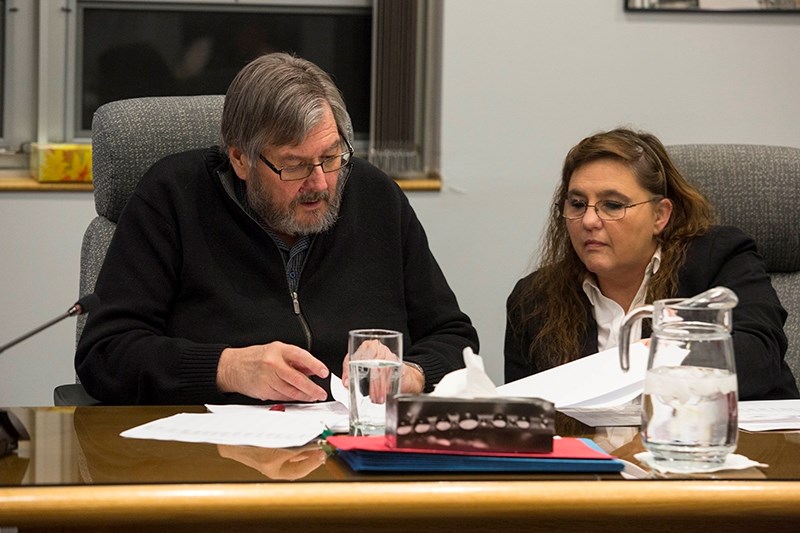 The Town of Athabasca&#146;s new financial director Donna Anderson listened as interim chief administrative officer Doug Topinka spoke at a council meeting Dec. 6.
