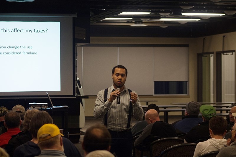 Jesse Ajayi, Athabasca County director of planning and development, spoke about the land redistricting at an information session Feb. 8 at the Multiplex.