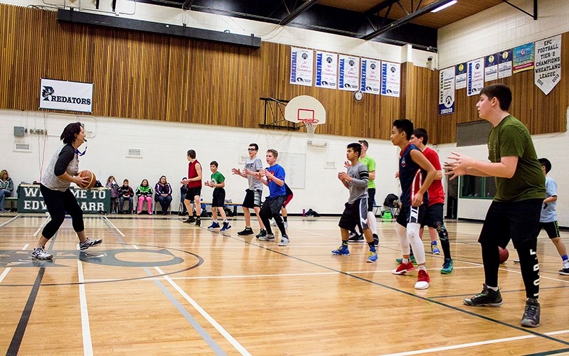 Athabasca Pacers coach Natasha Gillman-Oltmanns leads the basketball team through a series of drills during their practice April 23 at Edwin Parr Composite school.