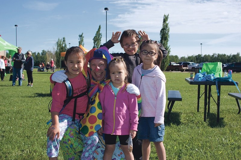 Mya, Joey the Clown, Kate, Marcus and Tiffany enjoyed breakfasta and playtime at the Muskeg Creek Trail Run June 17.