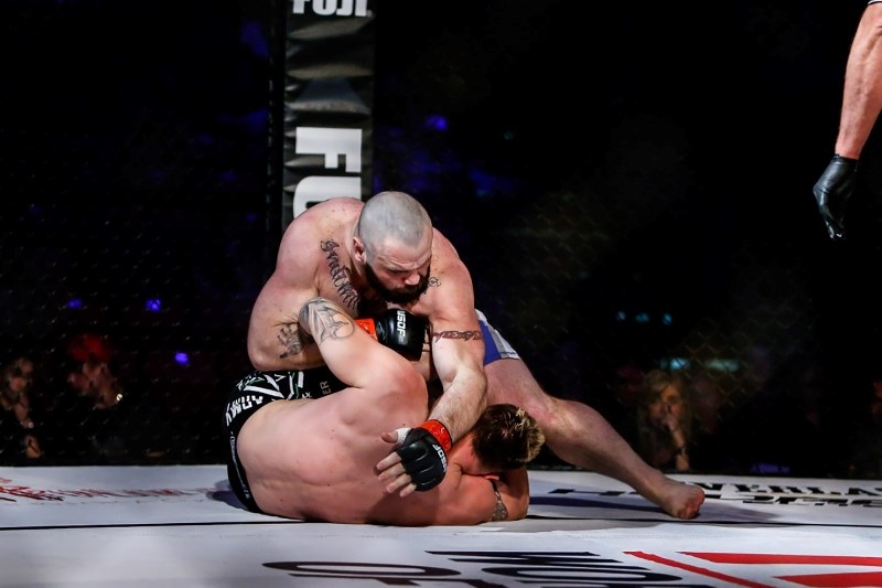 Tim Hague brings down his opponent, Matt Baker, in the World Series of Fighting division in 2015.