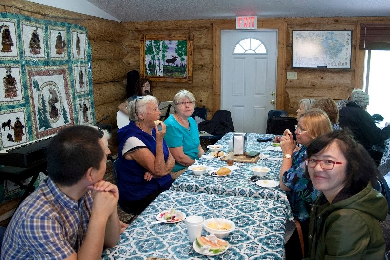 Darlene Woodward (back left) performes at the Athabasca Native Friendship Centre&#146;s National Aboriginal Day lunch.