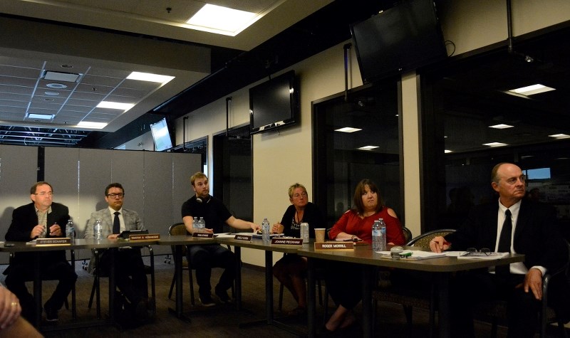 (L-R) Town of Athabasca Councillors Steve Schafer, Tim Verhaeghe, Tanu Evans, Shelly Gurba and Joanne Peckham and Mayor Roger Morrill listen as the municipal inspection