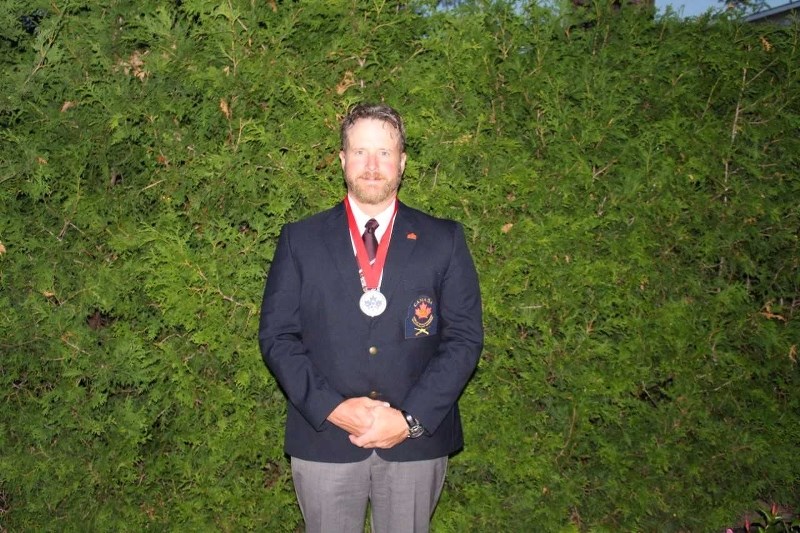 Brian Sztym stands with his silver medal at the 2017 F-Class World Championships in Ottawa.