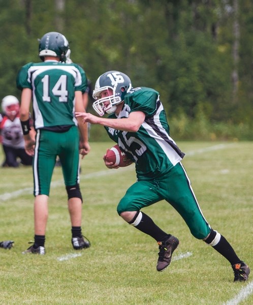 After a solid 17-year run, Pete Burden is stepping down as coach of the Athabasca Pacers. Pictured here, Pacers player Rylee Buchanan runs with the ball during the opening