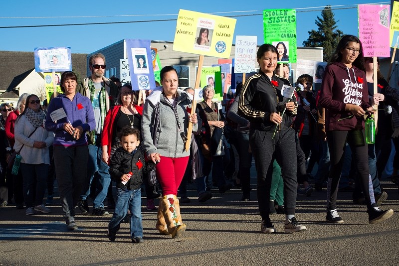 Two-year-old Trey Downes joined his mother Jasmine Downes in Athabasca&#8217;s Sisters In Spirit walk through the streets of town Oct. 4. She said he had come to the walk