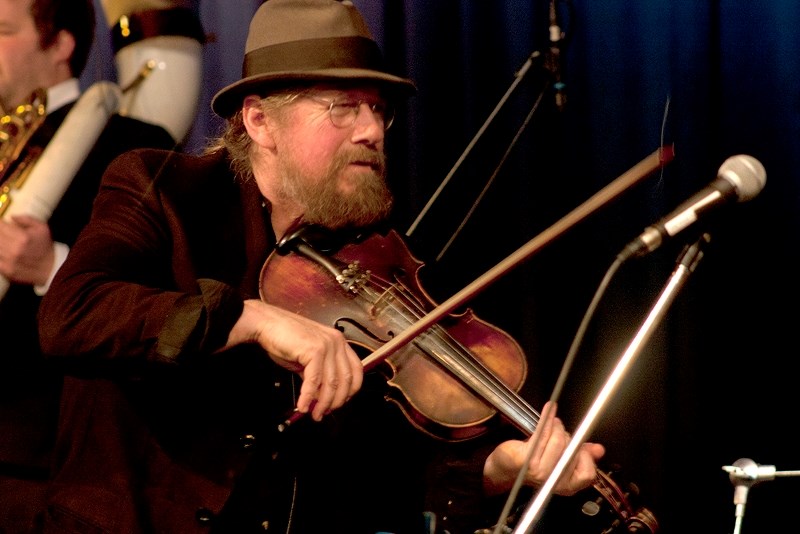 Cam Neufeld, lead for the Gadjo Collective, performs violin alongside his band at the Nancy Appleby Theatre on Nov. 18. The show marked the conclusion of the Fall 2017 season 