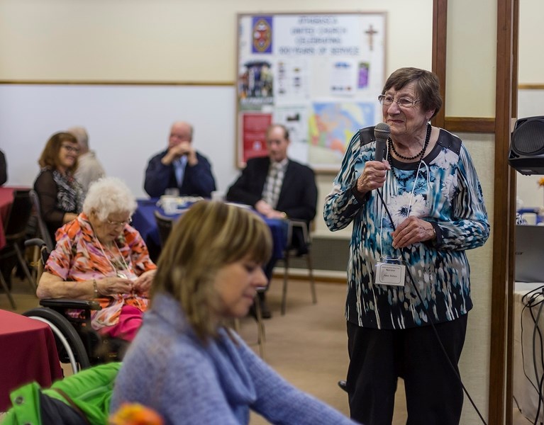 Ann Stiles speaks about her experience being interviewed for the Athabasca Area Seniors&#8217; Memory Project during a celebration of the project&#8217;s accomplishments Nov. 