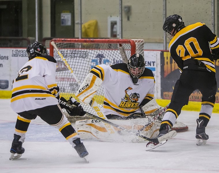 Athabasca Hawks Midget 1 goalie Brady Bilsky denies the Barrhead Steelers a goal during a Jan. 6 game at the Athabasca Regional Multiplex. The Hawks lost 11-0.