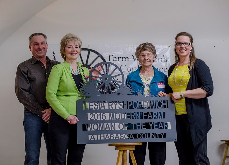 Lesia Rys-Popwich&#146;s family poses with her after winning the Modern Farm Woman award at the Athabasca County Rural Women&#8217;s Conference and Awards Feb. 2, 2017. This
