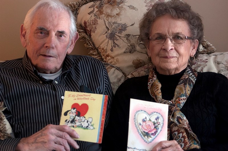 William Silkie and Patricia Silkie hold the first valentine&#8217;s cards they exchanged in 1949. The two have been married for nearly 57 years.