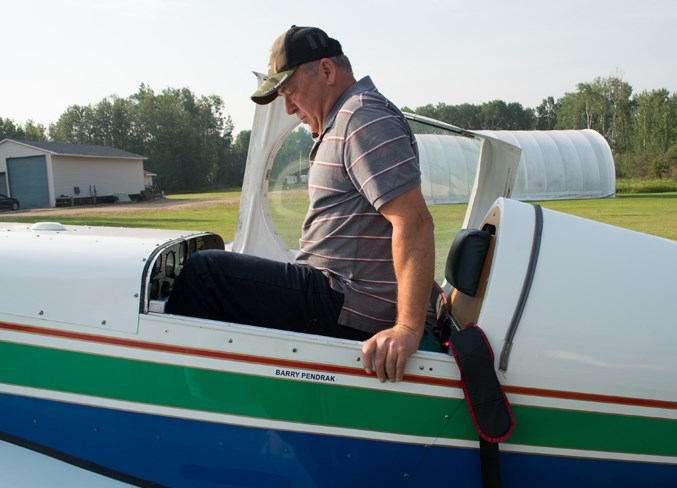  Pendrak hops into his Staudacher S-300 — the only one in Canada — for a practice round at his private airstrip just northwest of Athabasca near Hondo Aug. 14.