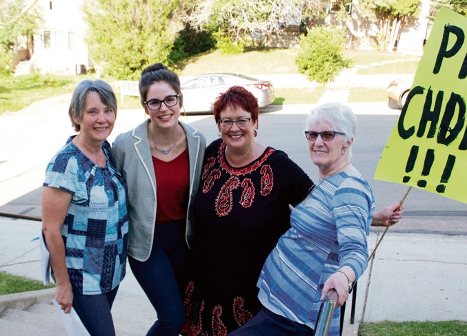  Pro-choice demonstrator Dawn Lewis (second from right) poses for the camera with (L-R) Vaune McKee, Emily Price and Max Rypien.