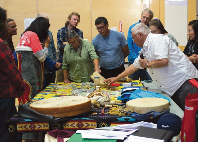  Elder Mike Beaver from Wabasca explains medicinal herbs and items that one can find in local forests and their purposes, including chaga mushroom, rat root and mountain ash.