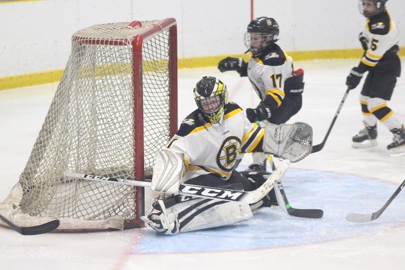 Bruins goaltender William Bain reacts to a goal attempt by visiting Athabasca Hawks players, during a provincial playdown game Jan. 18 that ended 11-3 for Barrhead.