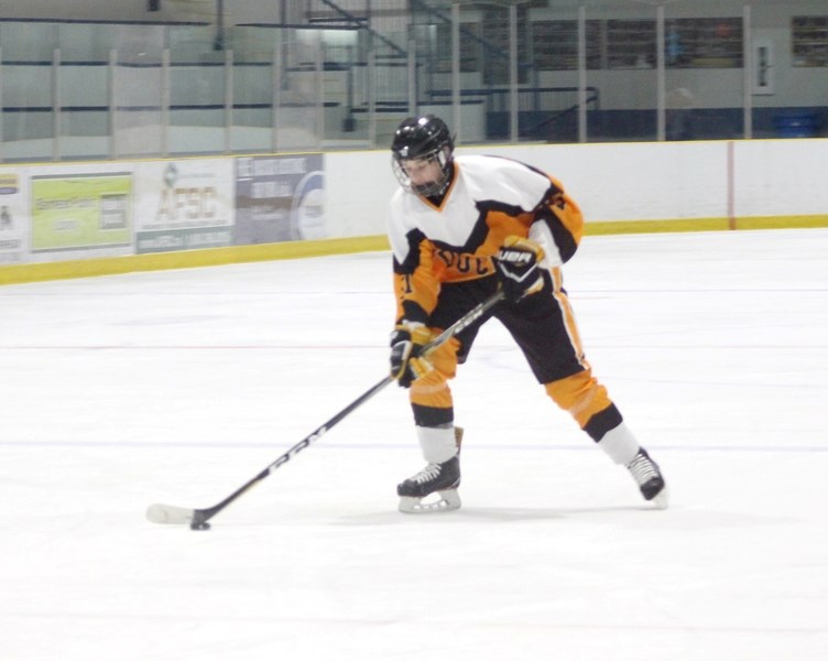 Barrhead Renegades player Ashton Gache prepares to take a penalty shot on Nordics goaltender Kenneth Andrews, in the first period of a league playoff game March 8. Barrhead