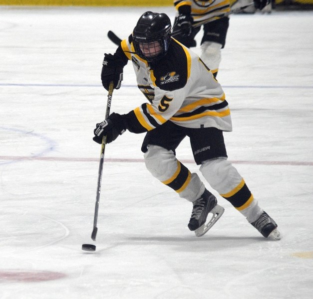 Barrhead player Kayden Rentz on a third period rush. Rentz ended the game with two goals and three assists.