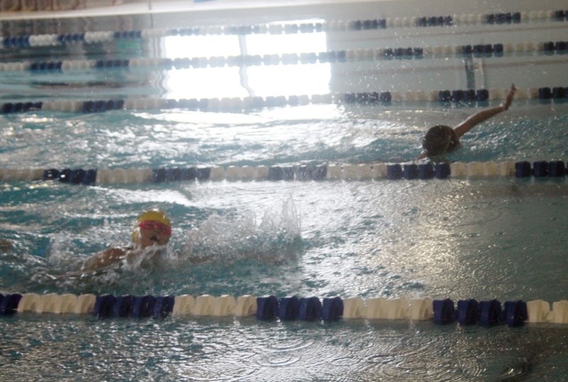 A pair of Barrhead Swim Club competitive swimmers participate in the 25-meter front crawl event, earning themselves unnofficial times as the event, hosted March 18 at the