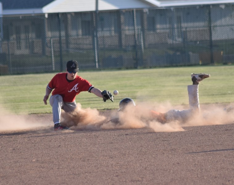 Players like Lee Worbec, seen here sliding into second during the Barrhead Orioles midget teams home opener two years ago, will now be able to continue their baseball career