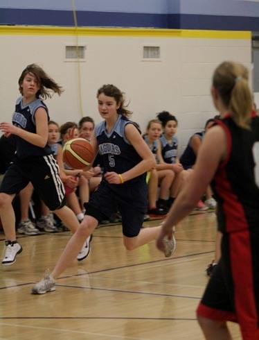 Sam Dodds drives to the net against Lilian Schick school in the opening game of the Jags&#8217; home tournament Saturday morning.