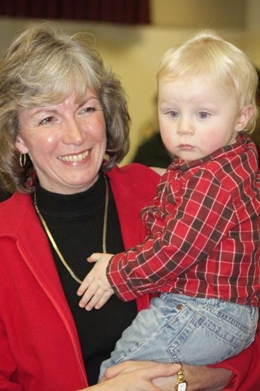How sweet it is: Maureen Kubinec with 21-month-old grandson Clay in the aftermath of her PC nomination victory at Westlock Memorial Hall on Saturday.