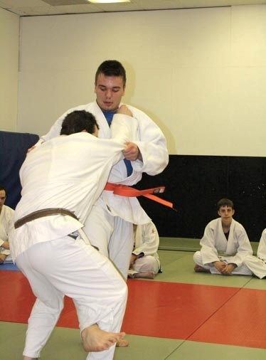 Morgan Boyson (facing camera) grapples with Chris Tiffin in practice at the Barrhead Judo Club on Feb. 1.