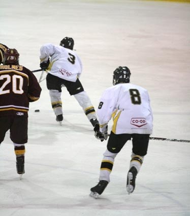 Connor Tiemstra (3) and Spencer Voight (8) charge into the offensive zone during the Steelers&#8217; 4-3 win against the Edge Gold Friday night at the Agrena.