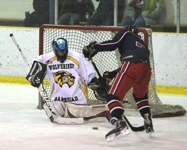 Wolverine goalie Zach Munroe makes a save against Wetaskiwin.