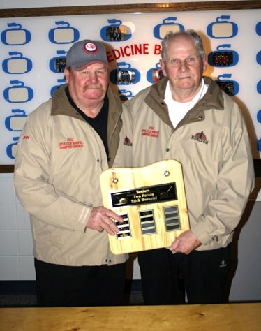 Stick curling winners John Busch (left) and Ray Wildfong. Wildfong and Cam Ray are headed to Regina on April 3-5 for the national two-person stick curling championships.
