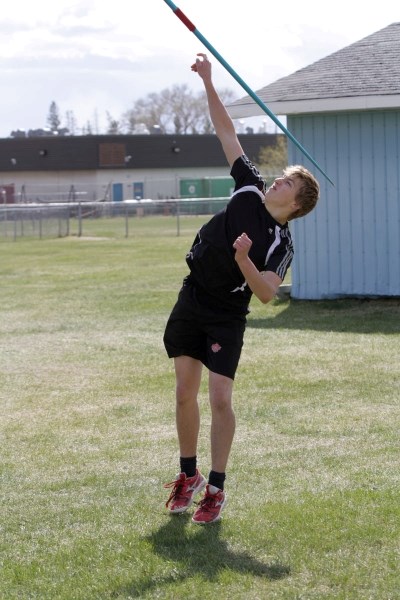Cam Gelderman practises throwing the javelin at a BCHS track and field practice on May 10.