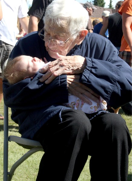 Age shall not divide us: Anna Schuring, aged 100, pictured last Saturday with baby Aliyah Viersen.